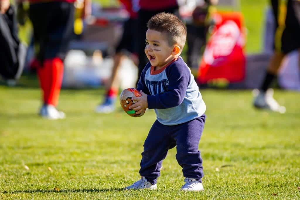 a child playing American football