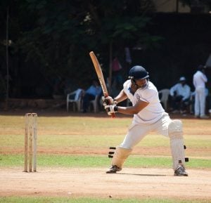 A batsman hitting a cricket ball