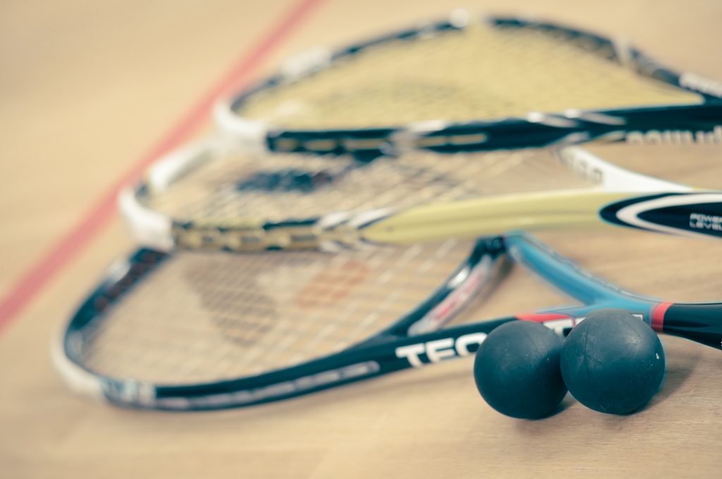 A Squash Ball and a Squash Racket
